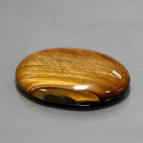 68,47 ctw natürlicher brauner Tiger's Eye, Oval Schliff, Lichtundurchlässig