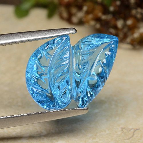 5.81ct Natürlicher Swiss Blue Topas, Blumen-Schliff, Transparent