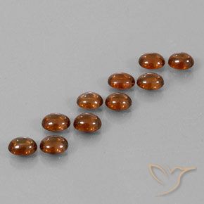 10.23 ct natürliche Dunkelorange Zirkon-Edelsteine, Oval, Transparent