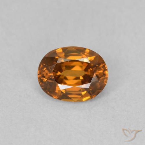 0.60ct Natürlicher tieforange Zirkon, Oval, VVS-VS