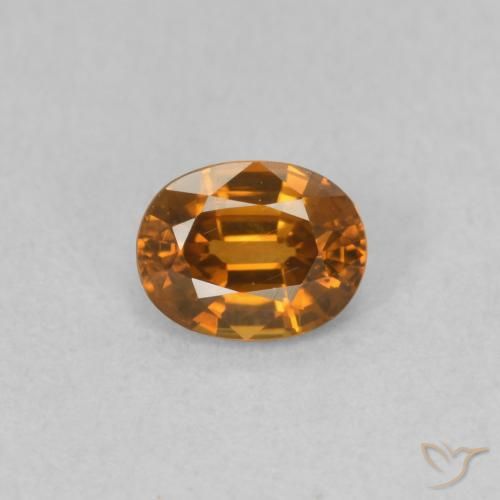 0.63ct Natürlicher Mittelorange Zirkon, Oval, VVS-VS