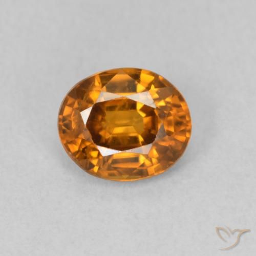 0.98ct Natürlicher Mittelorange Zirkon, Oval, VVS-VS, Photo A