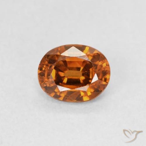 0.61ct Natürlicher tieforange Zirkon, Oval, VS