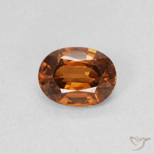 0.60ct Natürlicher Medium Dark-Orange Zirkon, Oval, VS