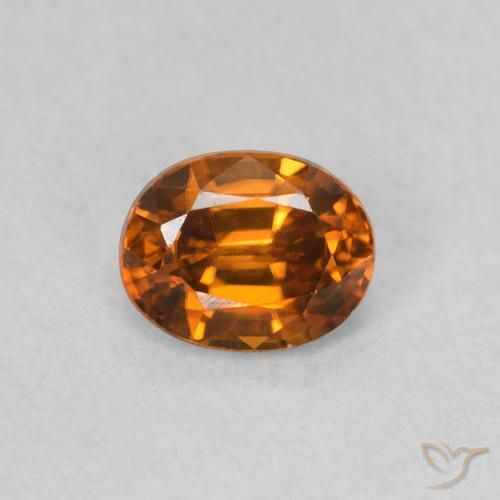 0.62ct Natürlicher Medium Dark-Orange Zirkon, Oval, VVS