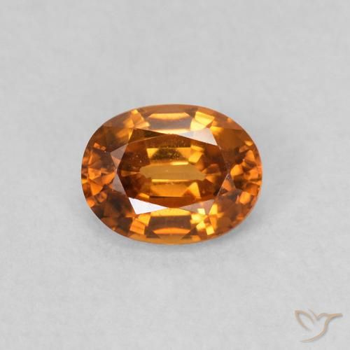 0.61ct Natürlicher orange-braun Zirkon, Oval, VVS