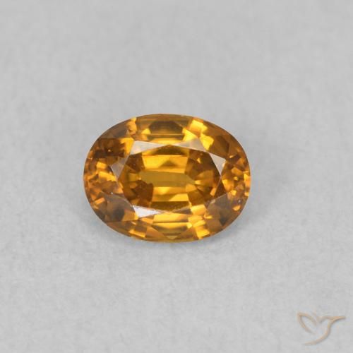 0.63ct Natürlicher bräunlich-orange Zirkon, Oval, VVS-VS