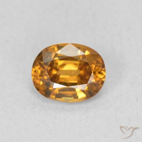 0.65ct Natürlicher bräunlich-orange Zirkon, Oval, VVS-VS