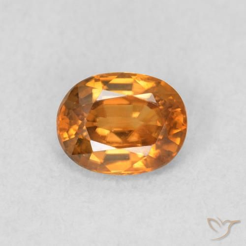 0.61ct Natürlicher Mittelorange Zirkon, Oval, VVS-VS