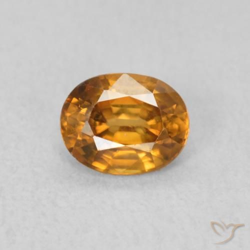 0.62ct Natürlicher orange-braun Zirkon, Oval, VVS-VS
