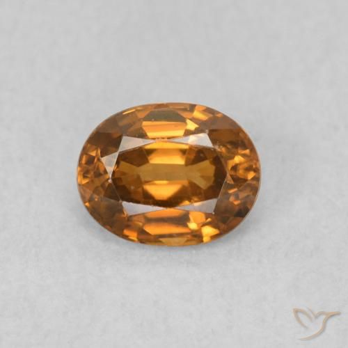 0.59ct Natürlicher orange-braun Zirkon, Oval, VVS-VS