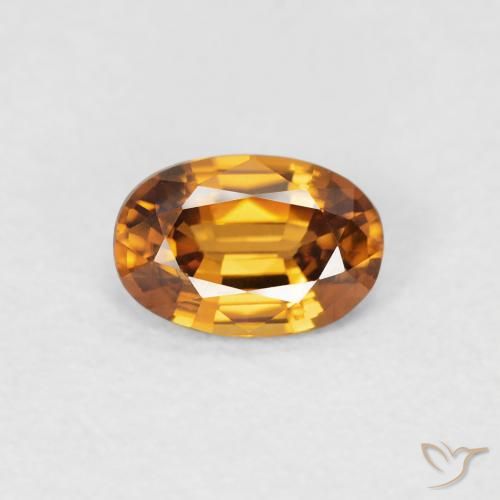 0.69ct Natürlicher Mittelorange Zirkon, Oval, VVS-VS