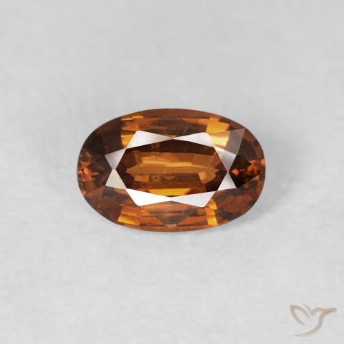 0.73ct Natürlicher Medium Dark-Orange Zirkon, Oval, VVS-VS