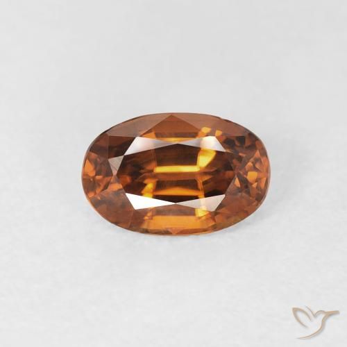 0.77ct Natürlicher tieforange Zirkon, Oval, VVS, Photo A