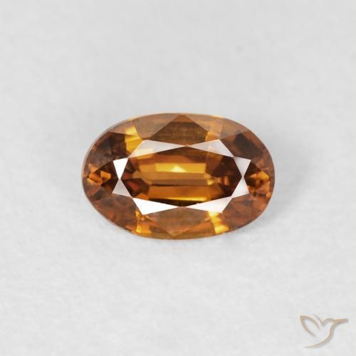 0.69ct Natürlicher orange-braun Zirkon, Oval, VVS-VS, Photo A