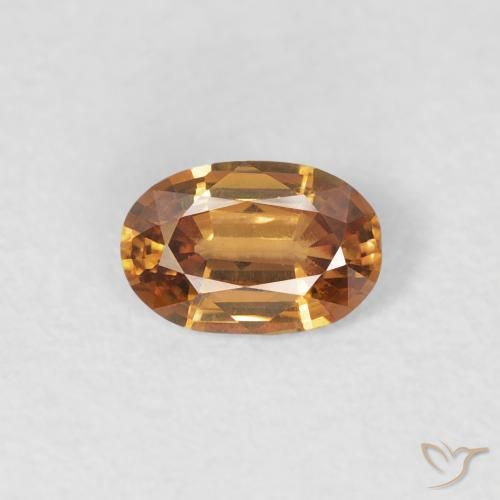 0.60ct Natürlicher Mittelorange Zirkon, Oval, VVS-VS, Photo A